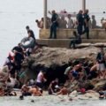 Madrid deploys army as thousands of Moroccans swim to Spanish enclave